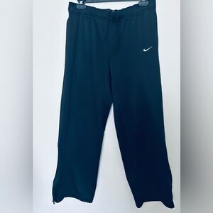Nike Black Track Pants with drawstring and zip up at ankle. EUC